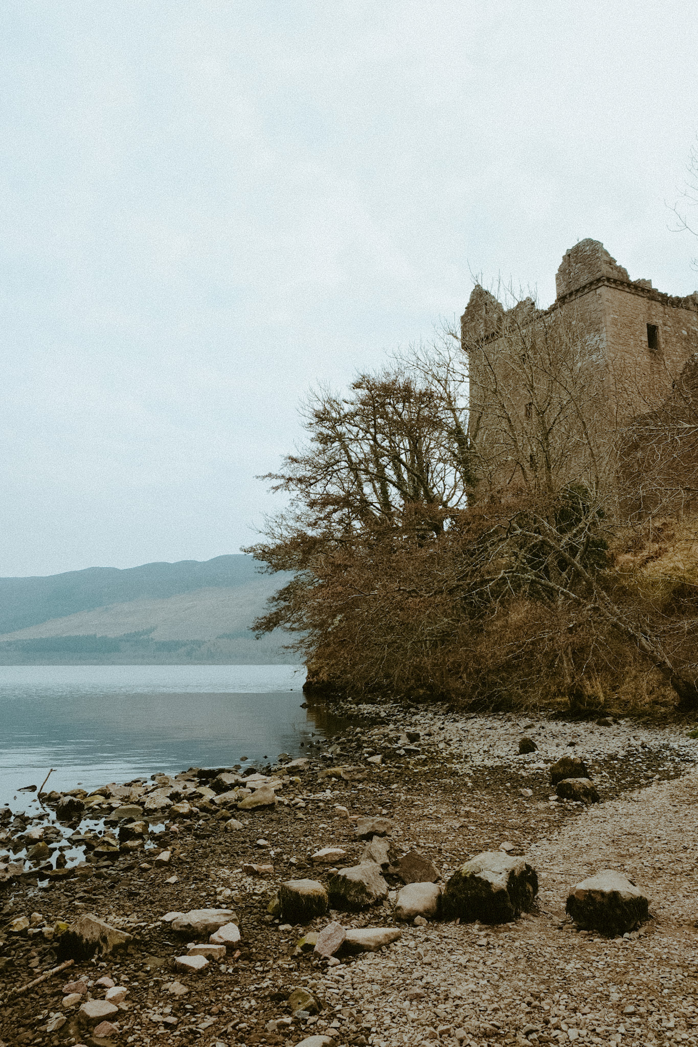 View of Urquhart Castle from the shores of Loch Ness near Inverness, Scotland.