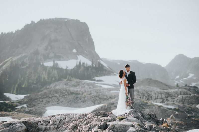 Bride and Groom at snowy lookout for Elopement