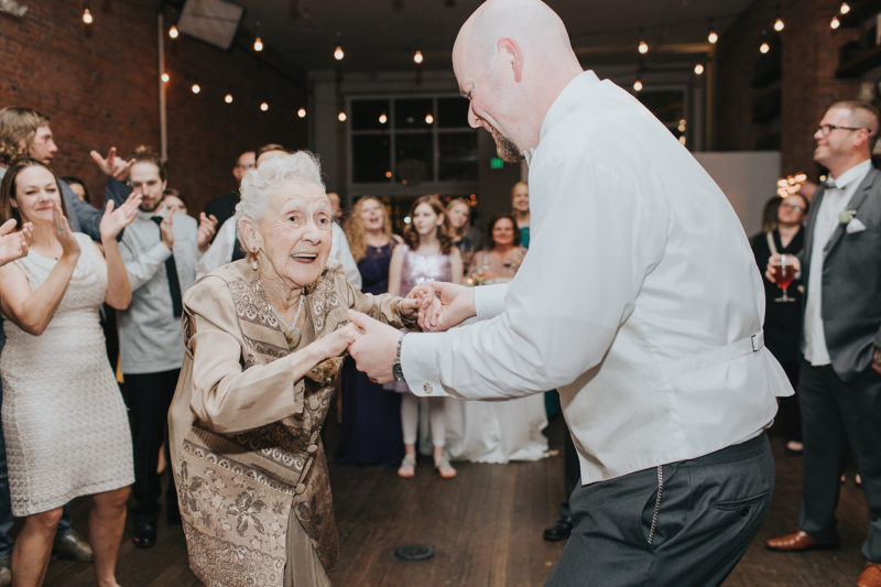 Groom dancing with Grandma at Axis Pioneer Square wedding
