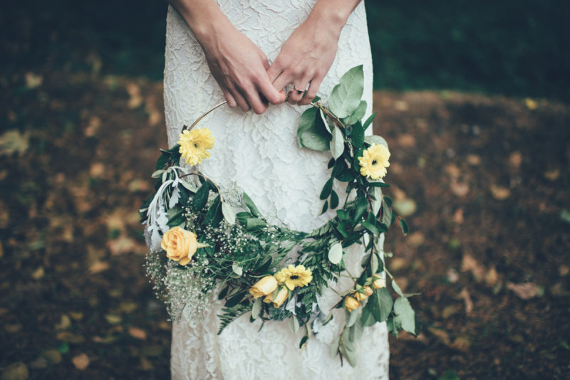 Yellow wedding flowers bridal bouquet asymmetrical wreath