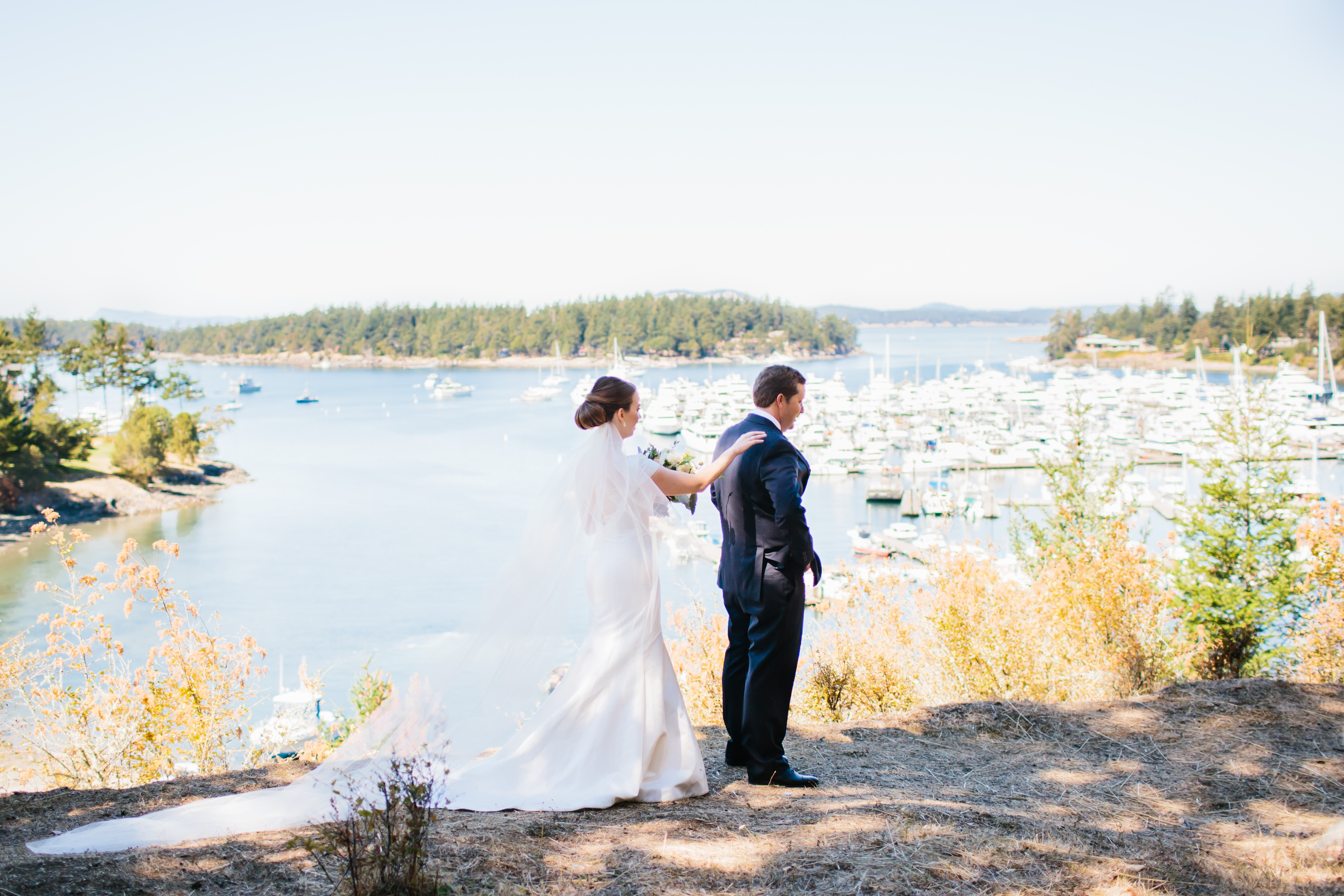 Bride and Groom's first look in front of Roche Harbor