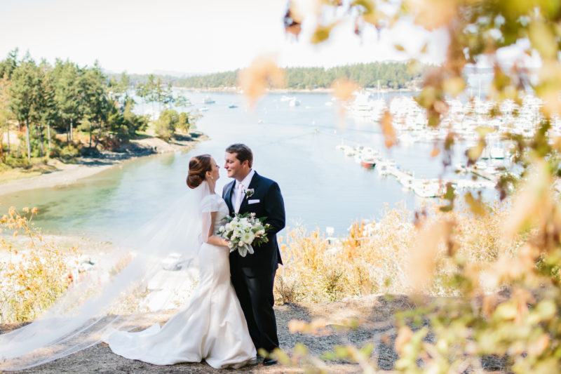 Bride and Groom in front of Roche Harbor Marina