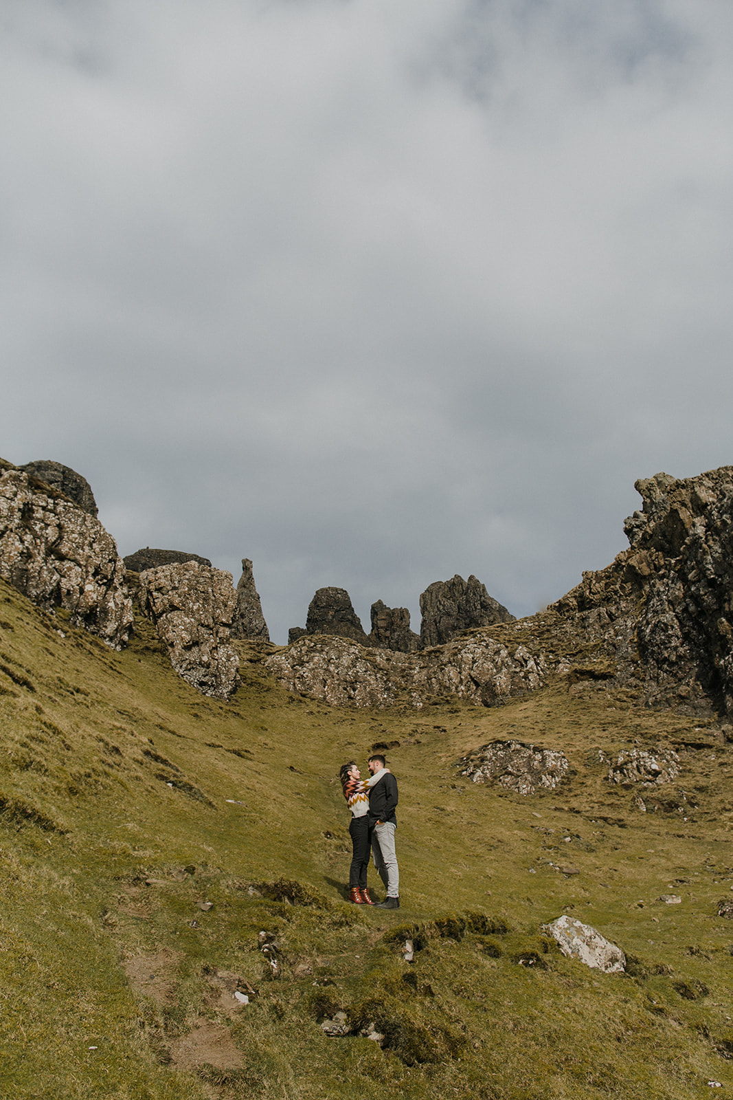 Couple at The Quiraing on Isle of Skye, Scotland.